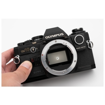 OM 10 zwart met 50mm 1.8 - Occasion