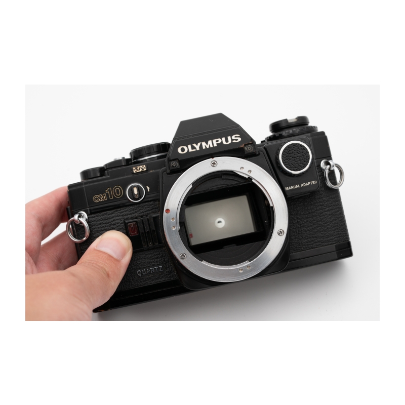 OM 10 zwart met 50mm 1.8 - Occasion